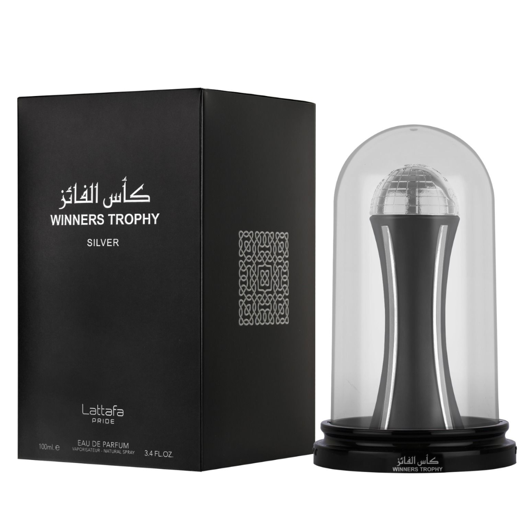 Lattafa Pride Winners Trophy Silver EDP 100mL perfume bottle with silver accents and elegant packaging.