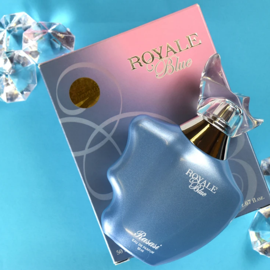 Royale Blue for Women Eau De Parfum by Rasasi, 50ml bottle with elegant packaging and floral fragrance design.