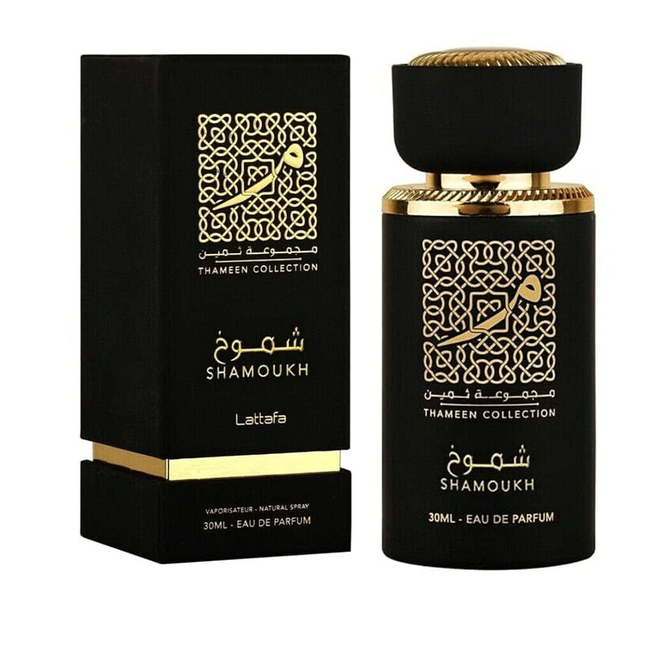 Lattafa Fakhar Thara Maali Shamoukh EDP 30ml perfume bottle, elegant design, showcasing the fragrance's luxurious packaging.