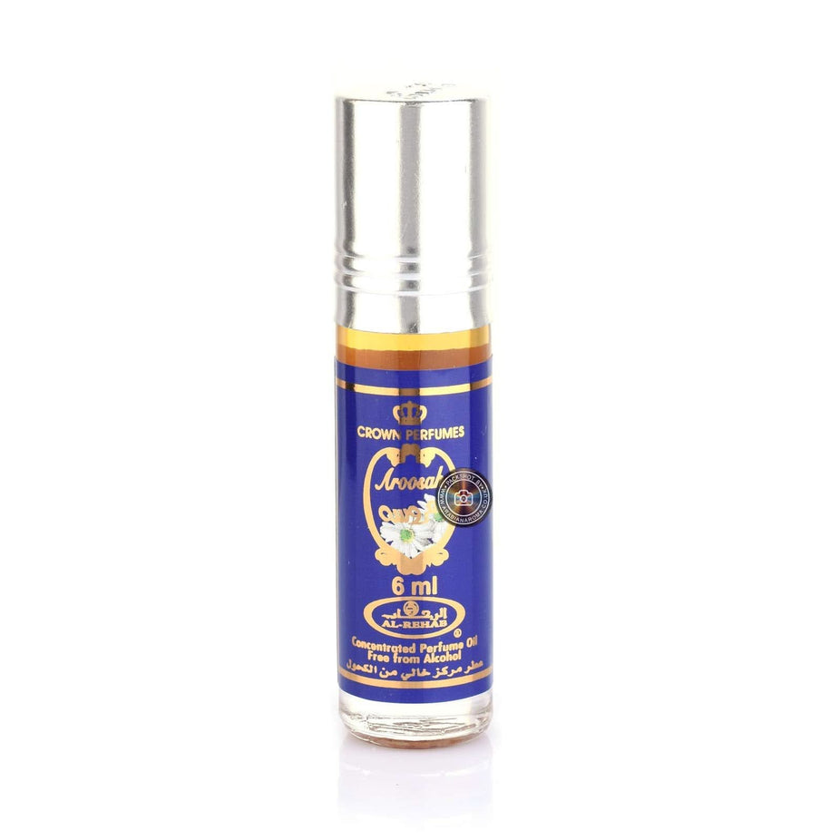 Six 6ml Al-Rehab Aroosah concentrated perfume oil roll-on bottles in a box, featuring elegant packaging and clear glass containers.