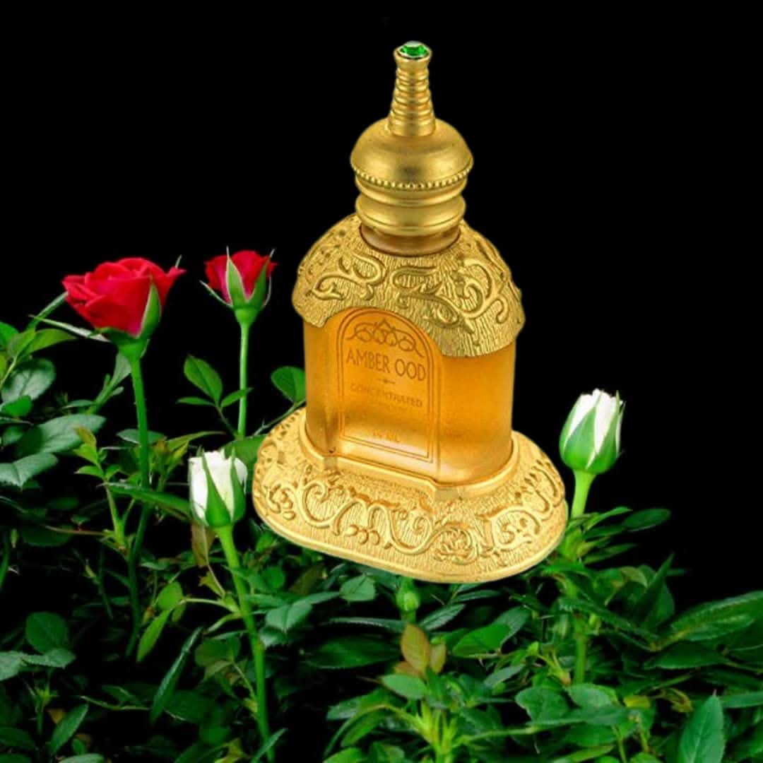 Amber Ood perfume oil by Rasasi in a 14ml bottle, displayed with a velvet pouch, showcasing the concentrated perfume oil.