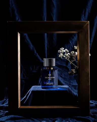 Intense Elite Collection For Men Eau De Parfum set featuring Bade'e Al Oud for Glory and LA Passion Blue bottles, elegant packaging.