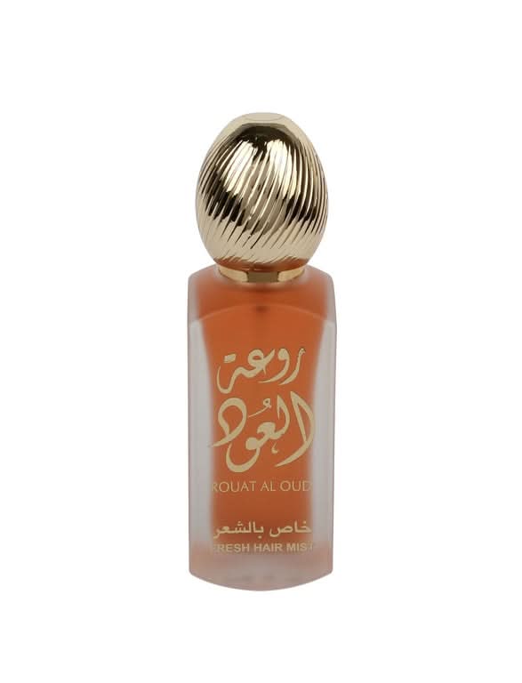 Lattafa Rouat Al Oud Hair Mist 50ml bottle, showcasing elegant packaging and floral-inspired design for luxurious hair fragrance.
