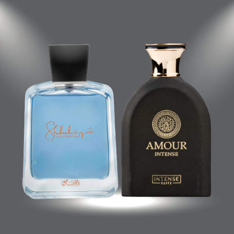 Two men’s Eau de Parfum bottles: Intense Elite AMOUR 100ML and Shuhrah Pour Homme 90ML, featuring elegant glass bottles.