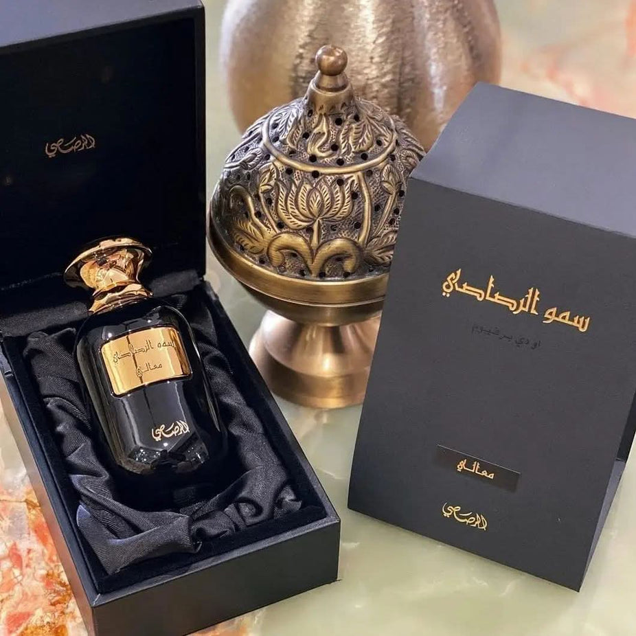 Rasasi Ma'ali Somow Al Eau de Parfum spray bottle, 100ml, with elegant design and floral notes visible in the image.