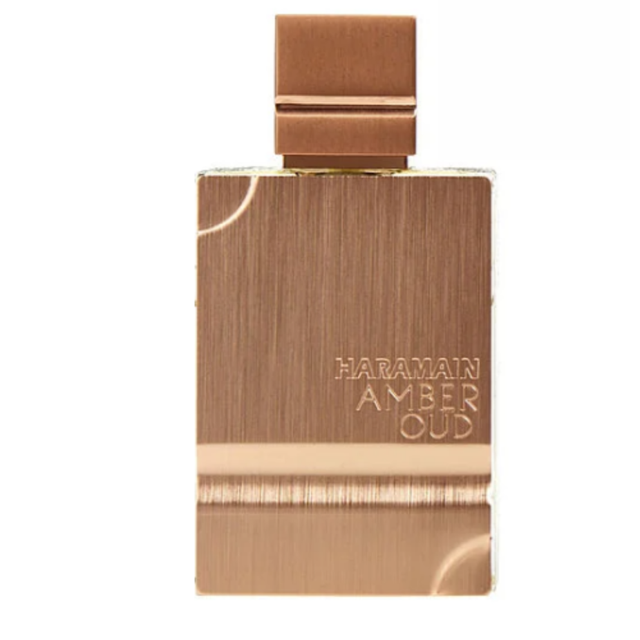 Al Haramain Amber Oud EDP perfume bottle with amber-colored liquid, 60ml (2 oz) Eau De Parfum on a white background.