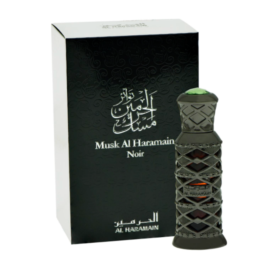 Al Haramain Musk Al Haramain Noir concentrated perfume oil in a 12ml bottle, featuring elegant packaging and a luxurious scent.