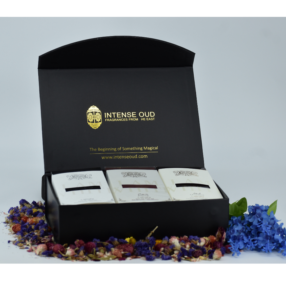 Lattafa Ana Abiyedh perfume gift set with leather and rouge EDP bottles, magnetic box, and elegant packaging.