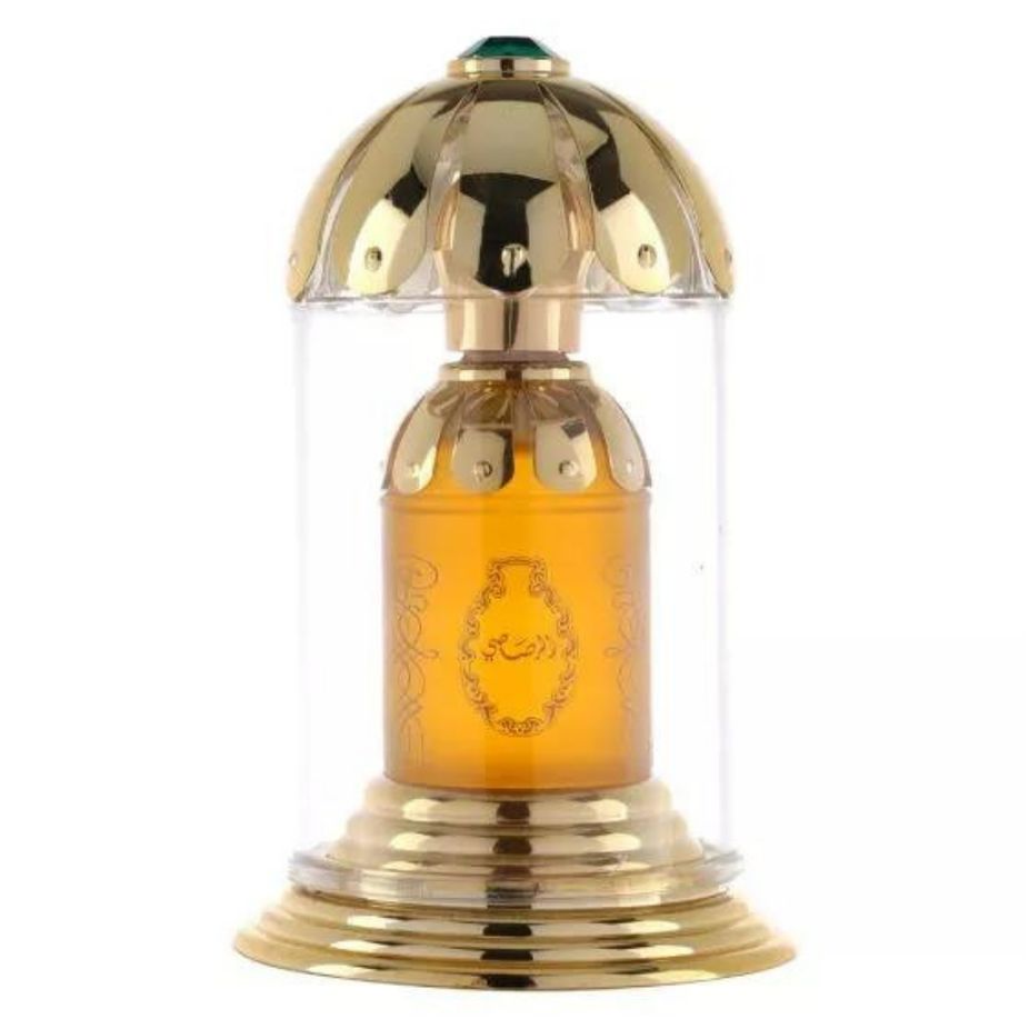 Rasasi Attar al Oudh Red and Attar Mubakhar Green perfume oils in 20ml bottles, featuring elegant glass containers with gold accents.