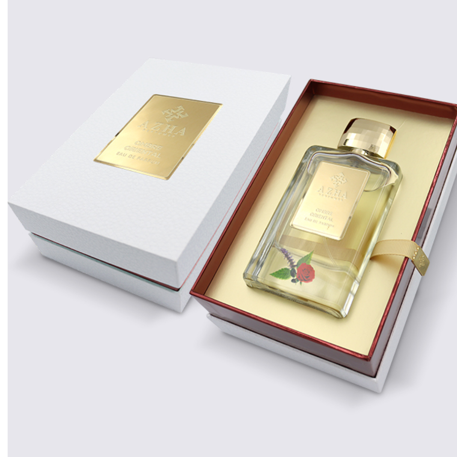 Azha Ombre Oriental Eau de Parfum bottle with intricate design, 100ML size, showcasing luxurious perfume packaging.