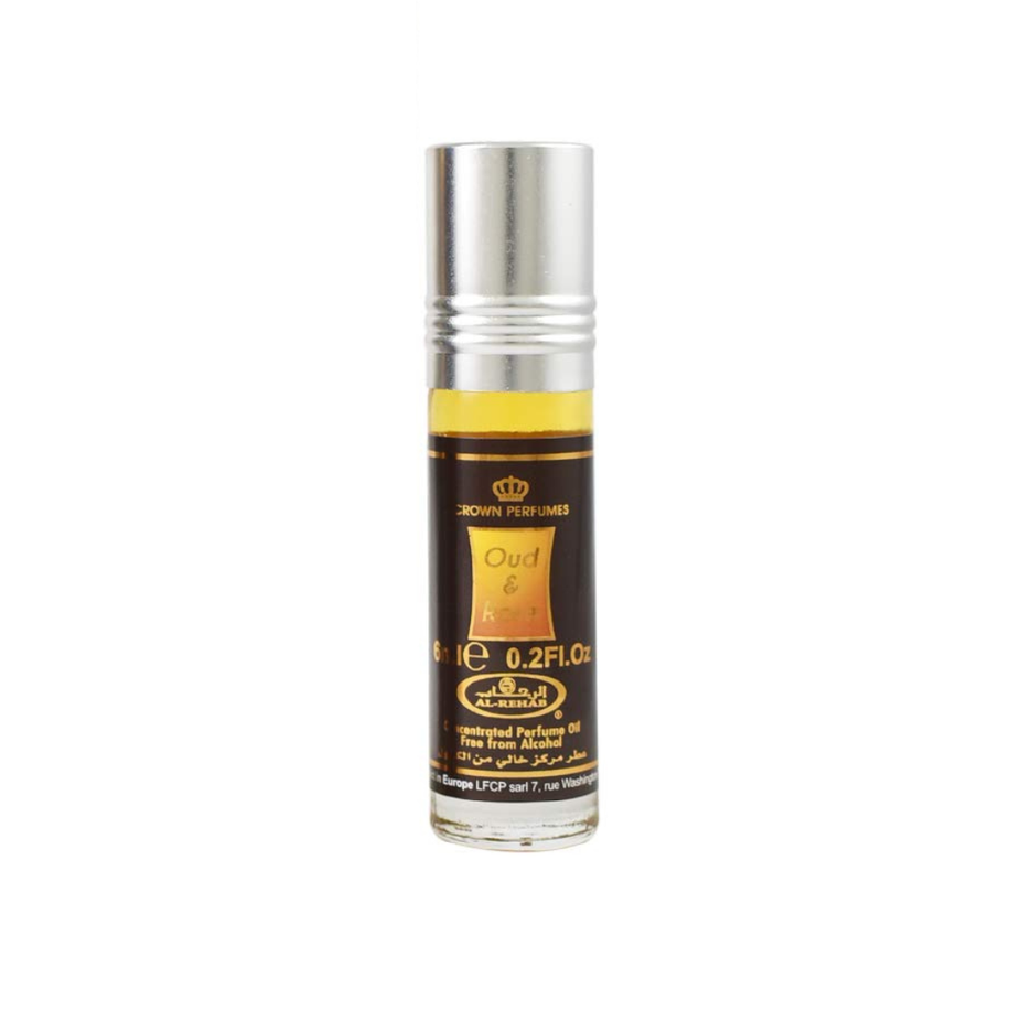 Al Rehab Oud & Rose 6ml concentrated perfume oil in a small glass bottle with a black cap, showcasing the product label.