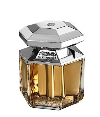 ASQ Intense Eau De Parfum for Men by Abdul Samad Al Qurashi, 100ml bottle, with elegant packaging and dark fragrance liquid.