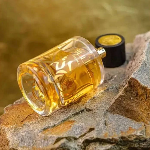 Thara Al OUD EDP by Ard Al Zaafaran in a 100ml bottle, showcasing the elegant fragrance bottle design.